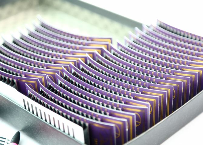 after “putting lashes on label card”